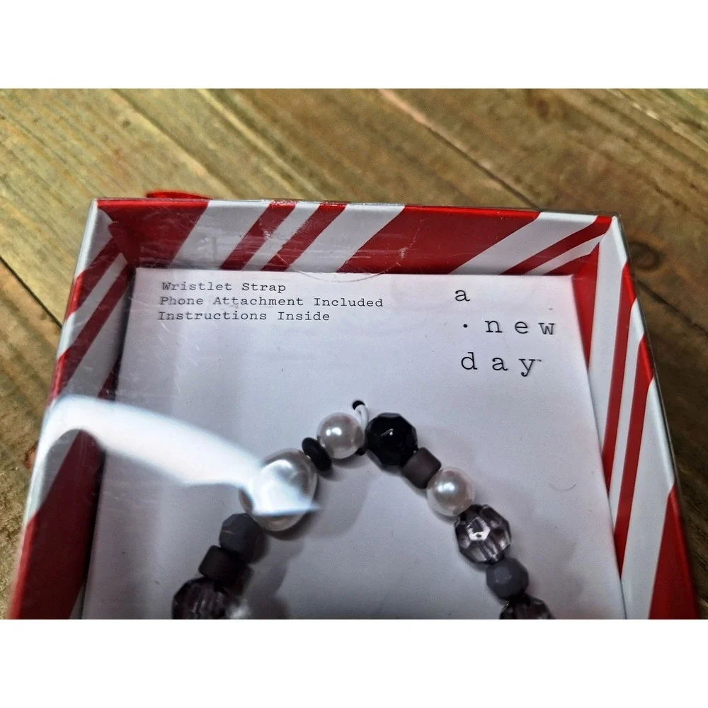 A New Day beaded crossbody strap and 3 beaded phone wristlets (gone tone clasps)